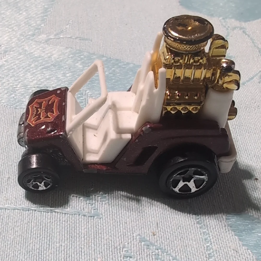 Gold and White Toy Car
